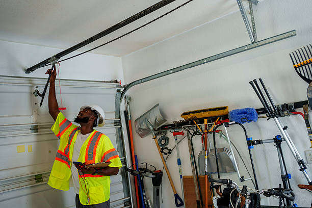 Professional Garage Door Panel Replacement technician working in Commerce, OK